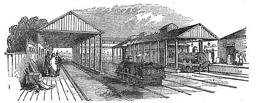 A black-and-white drawing of station platforms and canopies