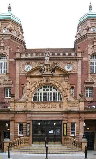 A red brick building facade seen from the front