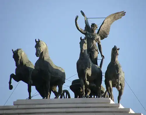 The Quadriga of Unity on the summit of one of the two propylaea