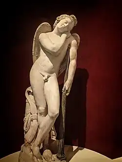 Roman statue of Eros, 100–200 CE depicting Eros sleeping, his torch turned down, a symbol of death used in many Roman memorials.