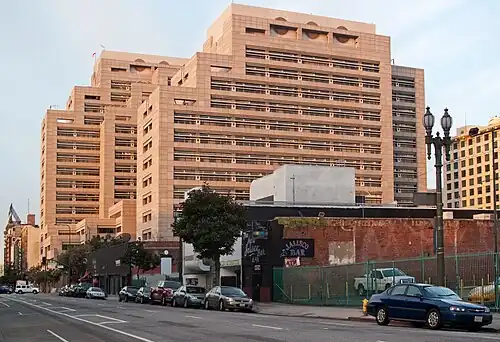 Ronald Reagan State Office Bldg. occupies the SE corner of 3rd & Spring today. Spring runs along its right side; this view looks south on Main St.