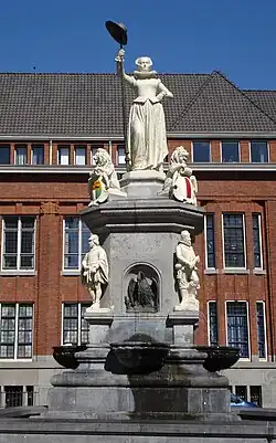 Dutch Maiden statue in Rotterdam, 1874, hat and costume in styles from the start of the Dutch Revolt.