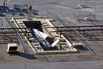 A missile emerges from the elevator at SF-88 (2008)