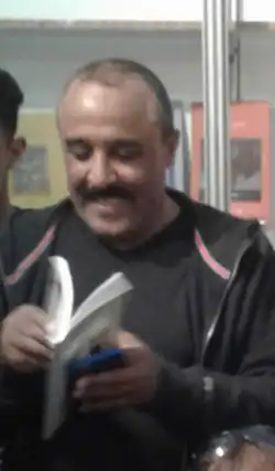 Photograph of the flipping through a book