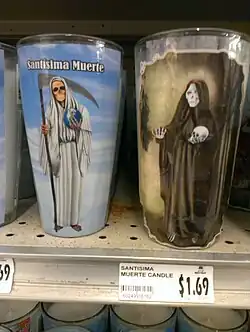 Votive candles for Santa Muerte, a Saint in Folk Catholicism