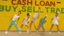 Color picture of the music video for "Serious"