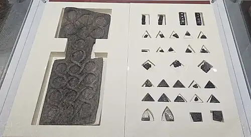The complete set of the Shahr-i Sokhta board game, Iran, with 27 pieces and 4 dice in its current condition, about c. 2600 BC – c. 2400 BC National Museum of Iran
