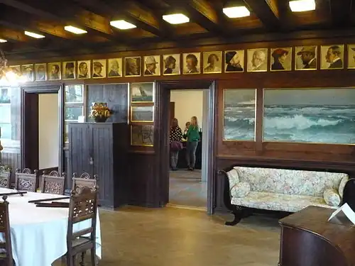 The dining-room with paintings