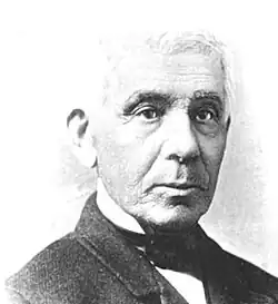 Black and white head and shoulders photo of Smith A Boughton, seated and looking right, circa 1885