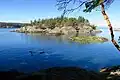 A view of beach, rocks and island in the park
