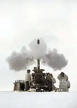 Soldiers of 29 Commando Regiment Firing a 105mm Light Gun on exercise in Norway, February 2014.