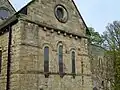 St Laurence's Church, Warkworth, Northumberland, showing the Neo-Norman east windows that Christian provided for the church during his restoration of the chancel in 1860[65]