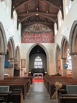 Interior of the nave, showing the Doom over the chancel arch
