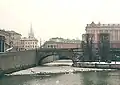 Southern part of the bridge in March 2007. In the background are the Riksdag building, Mynttorget, and Riddarholmskyrkan.