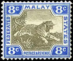 Stamp with art of a tiger surrounded by a blue border containing the words "Federated Malay States Postage&Revenue", and the value of 8c