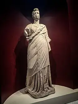 Statue of a woman with hairstyle dating to the later Roman Republican or Augustan period but body dating to 200–100 BCE