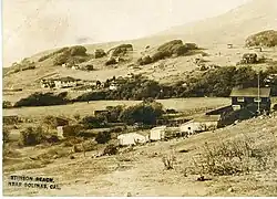 1916 photo postcard of Stinson Beach, showing Airey's Hotel to the left
