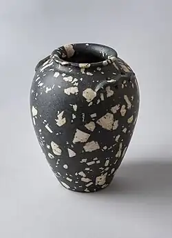 Porphyritic andesite jar with wavy handles