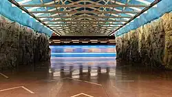 Artwork (sides) with train passing (middle)