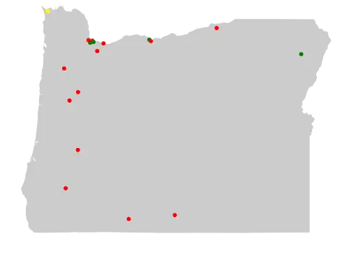 Outline of map of Oregon with colored dots representing the location of Superfund sites in the state