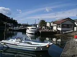 Small boats and houses.