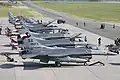 Czech Alcas and U.S. F-16's sit side by side on the ramp at Caslav Air Base, Czech Republic.