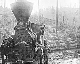 No. 5 and a load of pine logs in 1918.