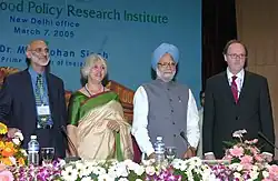 Dr. Ahluwalia with former Indian Prime Minister Dr. Manmohan Singh at the inauguration of the New Delhi office of the International Food Policy Research Institute.