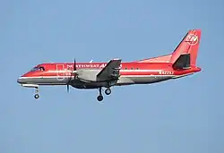 Northwest Airlink Saab 340 operated by Mesaba shortly after takeoff from Minneapolis St-Paul (2007)