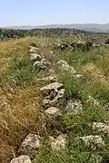 Remains of thick wall at Khirbet et-Tibbâneh