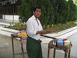To hpu thouk (Burmese tofu salad) hawker at Kuthodaw Pagoda, Mandalay