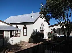 1882 church, now the parish hall, behind