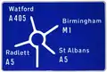 Advance direction sign on the immediate approach to a junction with the motorway.