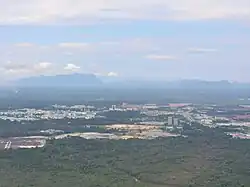 View of Samarahan district from Kuching. Wisma SALCRA is at the centre of the image while to the left is the UNIMAS campus.