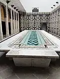 Marble inlay table with water pool down the center