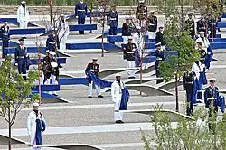 Dedicating the memorial by uncovering the benches