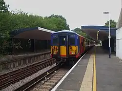 Looking north, with unit 5734 awaiting return to London. The up (London-bound) platform on the left has never seen passenger use.