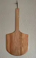 This pizza peel was made from oak floorboards that was salvaged from a home demolition.