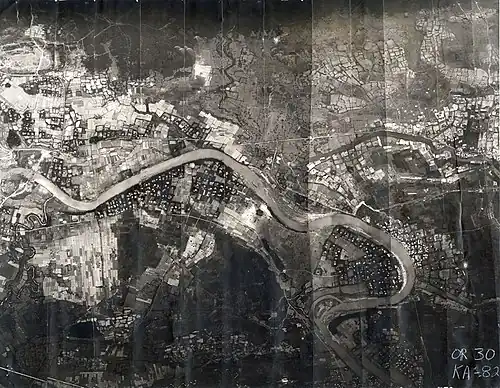 The 3rd Aerospace Rescue Recovery Group used this mosaic reconnaissance photograph to plan Lt. Col. Hambleton and 1st Lt. Mark Clark's rescue. The Cam Lo Bridge is shown at the far left. On 7 April, Hambleton was about 1,000 yards (910&nbsp;m) above the river and Clark was near the river.[7]: 76 
