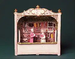 Venetian fair shop, "Marchand de Mode", with two figures, c. 1665, 6 inches high