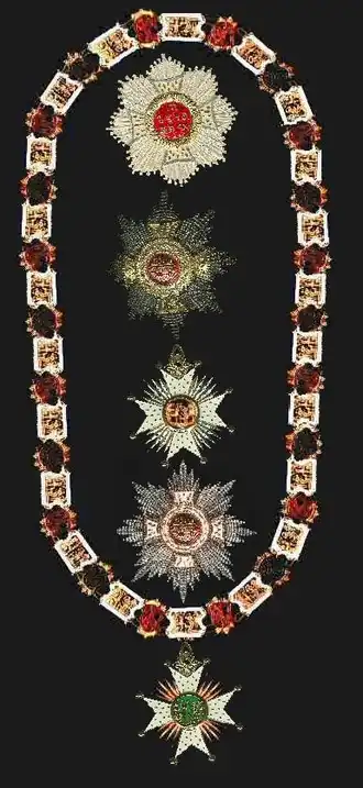 A jeweled chain and three jeweled star-burst medallions.
