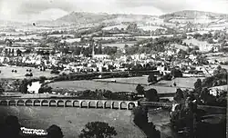 View of Monmouth from South at Penallt, with railway bridges and viaduct in the foreground.