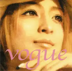 A close-up of Ayumi Hamasaki's face, having been edited with digital effects. The song's title, "Vogue", is present on screen.