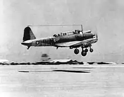Two Vought SB2U-3 Vindicators of VMSB-241 take off from Midway Atoll. Plane No. 6 in the foreground (BuNo 2045) was flown on June 4, 1942 by 2nd Lt James H. Marmande with PFC Edby Colvin as gunner. This plane was flown in the morning attack against the Japanese and disappeared on the night of 4/5 June about 16 km (10 mi) from Midway.