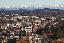 Rebbio as seen from the south with the Alps in the background