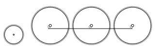 Diagram of a single small leading wheel, and three driving wheels joined by coupling rods
