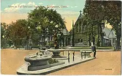 A fountain on a triangular stone base