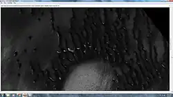 Group of dunes with most of the frost gone, as seen by HiRISE under HiWish program. Some ripples are visible.