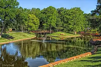 A pond with a fountain.