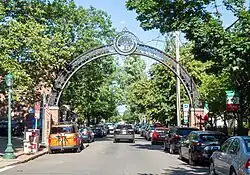Wooster Street archway decorated with a cherry blossom tree, a symbol of New Haven